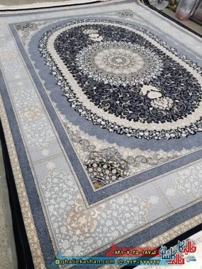 فرش ‌700 ‌شانه ‌طرح ‌صدرا ‌رنگ ‌سرمه ‌ای ‌کاشان ‌زمینه
