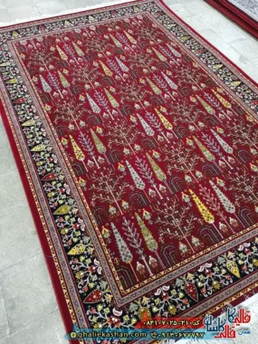 فرش ‌سنتی ‌700 ‌شانه ‌طرح ‌سرو ‌رنگ ‌قرمز ‌روناسی ‌کاشان ‌اصلی
