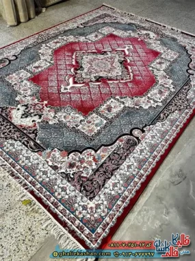 فرش کلاسیک 700 شانه خشتی طرح چشمه رنگ قرمز لاکی کاشان